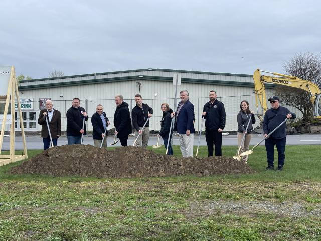 Members of the County Legislature, Schenectady Youth Hockey Association, and the Wemple family with shovels preparing to break ground on the expansion and renovation of the County's Recreational Facility.