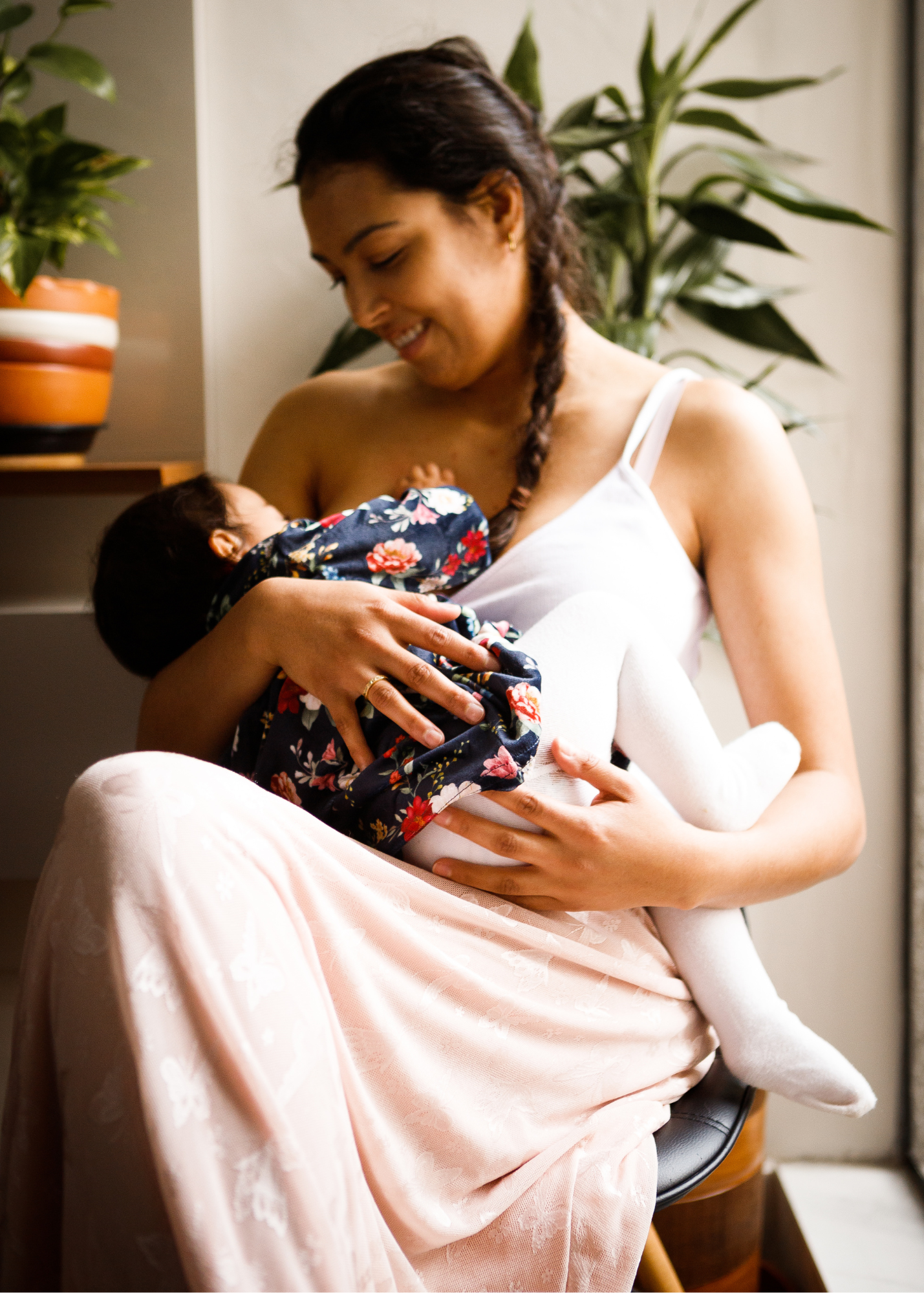 mom breastfeeding infant child