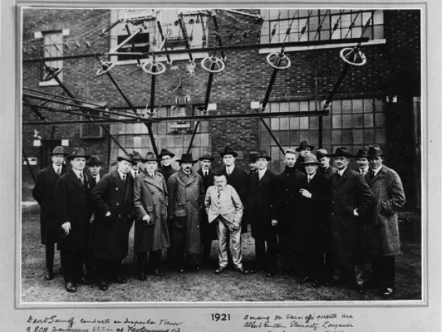 Charles Steinmetz stands outside RCA building with Albert Einstein and other prominent General Electric scientists in 1921.