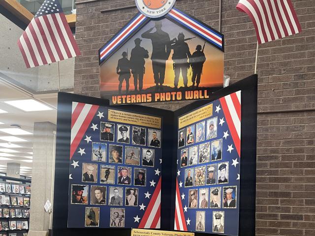 Photo of the Veterans Photo Wall at the Hon. KBJ Library